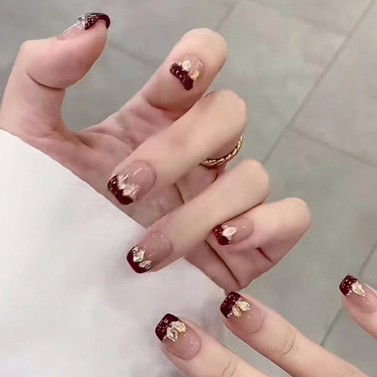 Burgundy French Tip with Gold Foil Design, Nude Base Square Artificial Press-on Nails