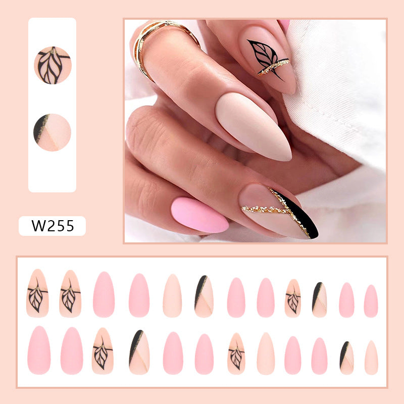 Elegant Matte Almond Stiletto Nails, Pink and Nude with Black Leaf Design, Gold Glitter Accent, Press on Nails