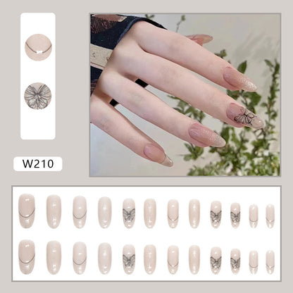 Almond Press-On Nail Set – Nude Shimmer French Tips with Black Butterfly Accent | Glossy Reusable False Nails