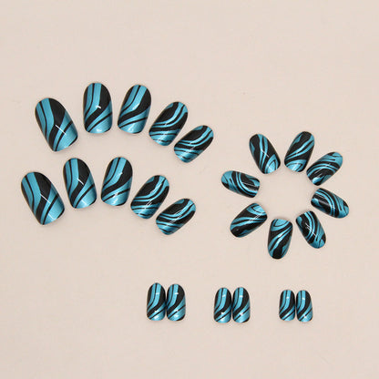 Midnight Wave Almond Press On Nails – 24 Piece Black & Metallic Blue Abstract Nail Set