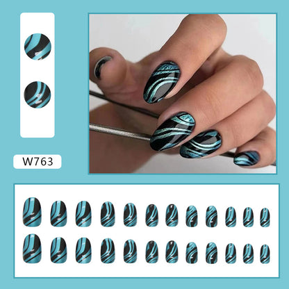 Midnight Wave Almond Press On Nails – 24 Piece Black & Metallic Blue Abstract Nail Set