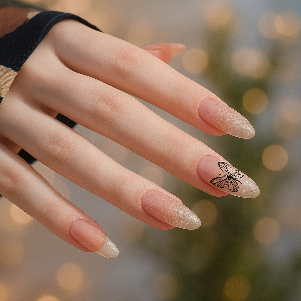 Almond Press-On Nail Set – Nude Shimmer French Tips with Black Butterfly Accent | Glossy Reusable False Nails