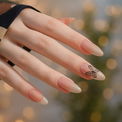 Almond Press-On Nail Set – Nude Shimmer French Tips with Black Butterfly Accent | Glossy Reusable False Nails